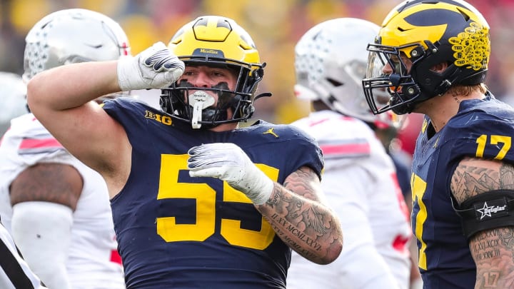 Michigan defensive lineman Mason Graham celebrates a tackle against Ohio State during the second half at Michigan Stadium in Ann Arbor on Saturday, Nov. 25, 2023.